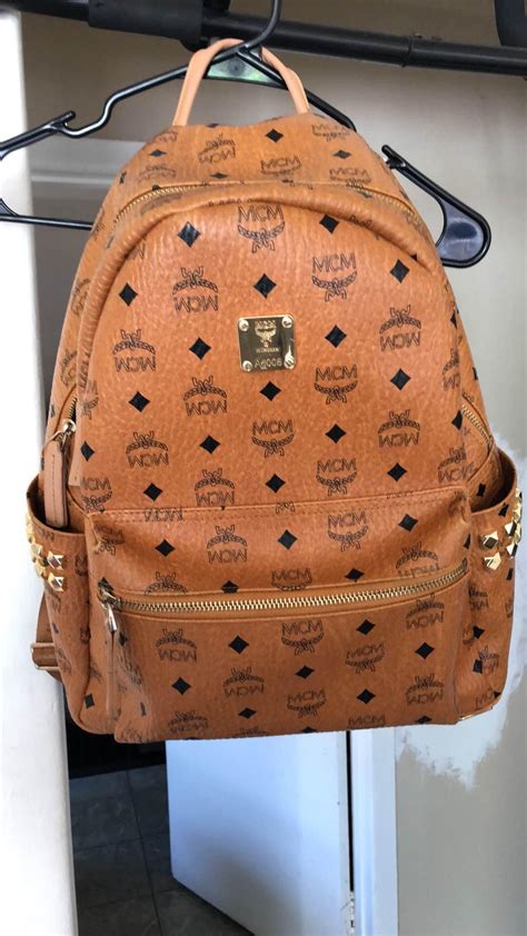 mcm replica bag|how to spot a fake mcm bag.